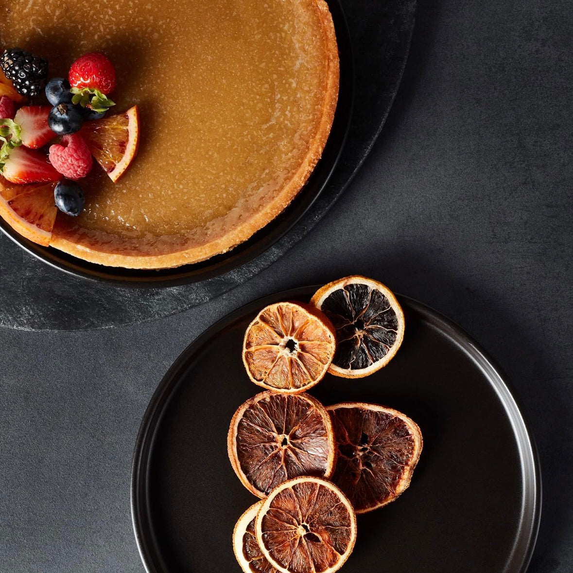 Stone Lain Celina 16-Piece Stoneware Round Dinnerware Set, Service for 4 - Black Matte Plates, Bowls and Dish, Service for 4 – Minimalist Round Style, Microwave & Dishwasher Safe